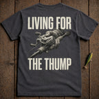 T-shirt with fishing reel graphic and text "LIVING FOR THE THUMP".