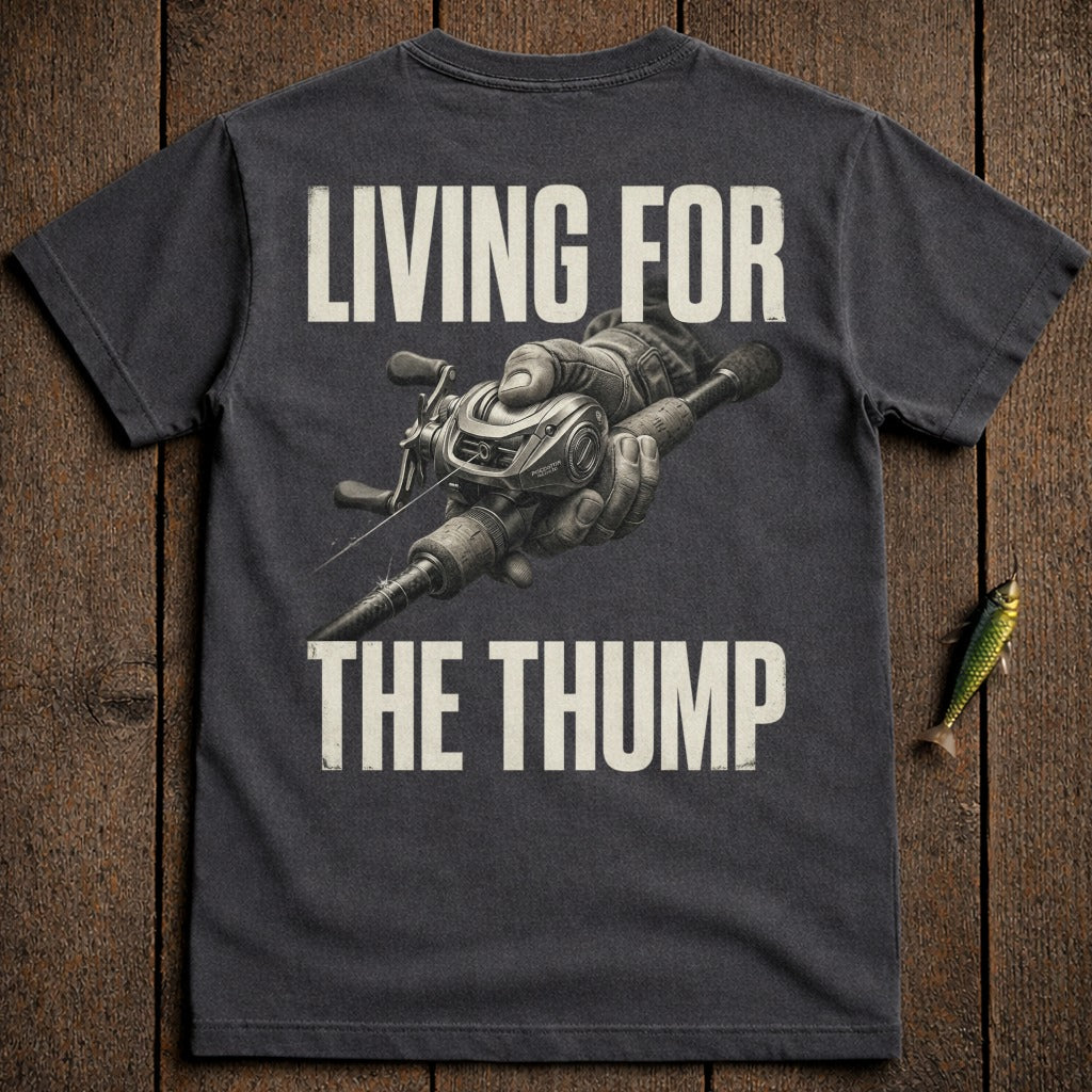 T-shirt with fishing reel graphic and text "LIVING FOR THE THUMP".