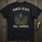 Dark t-shirt with "PUNCH HEAVY. PULL HARDER." and fishing lure illustration.