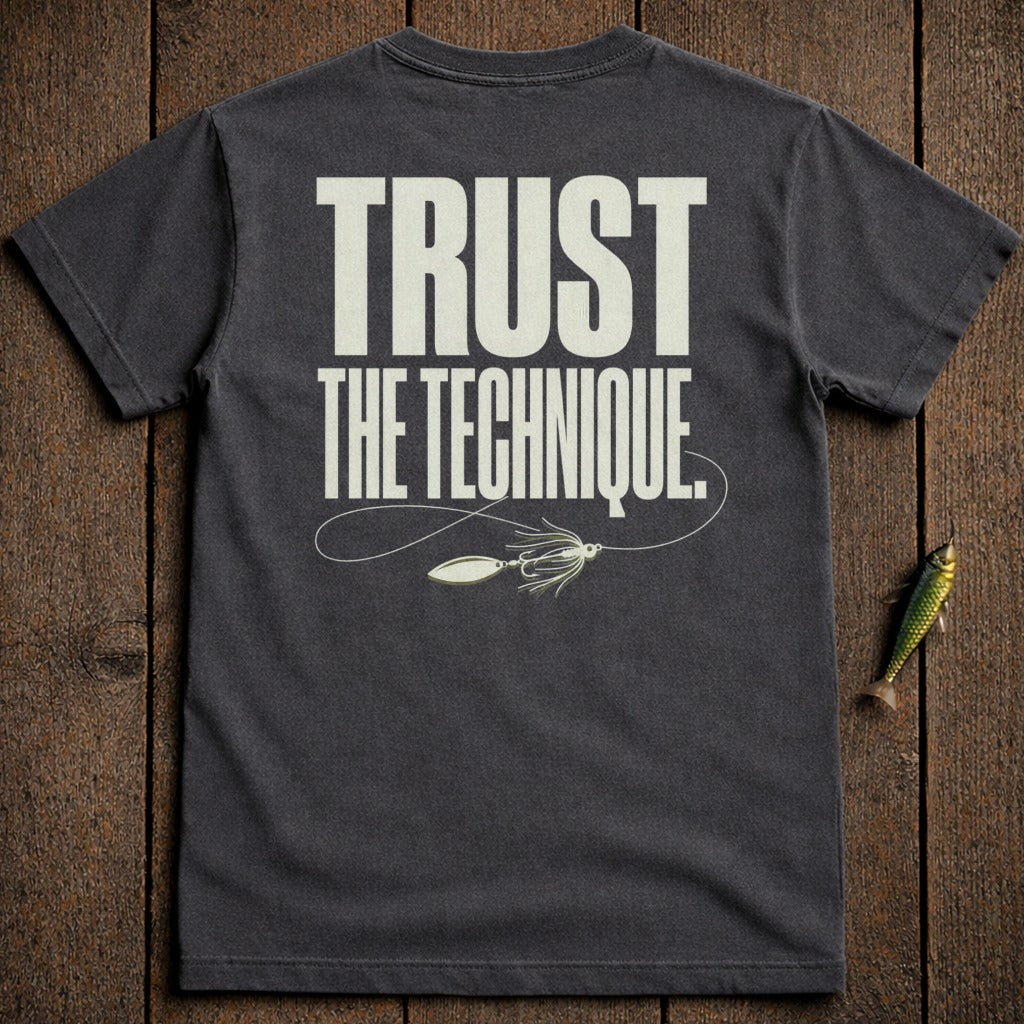Dark gray t-shirt with "TRUST THE TECHNIQUE." and a fishing lure graphic.