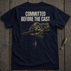 Dark blue t-shirt with "COMMITTED BEFORE THE CAST" and illustration of hand holding fishing rod.