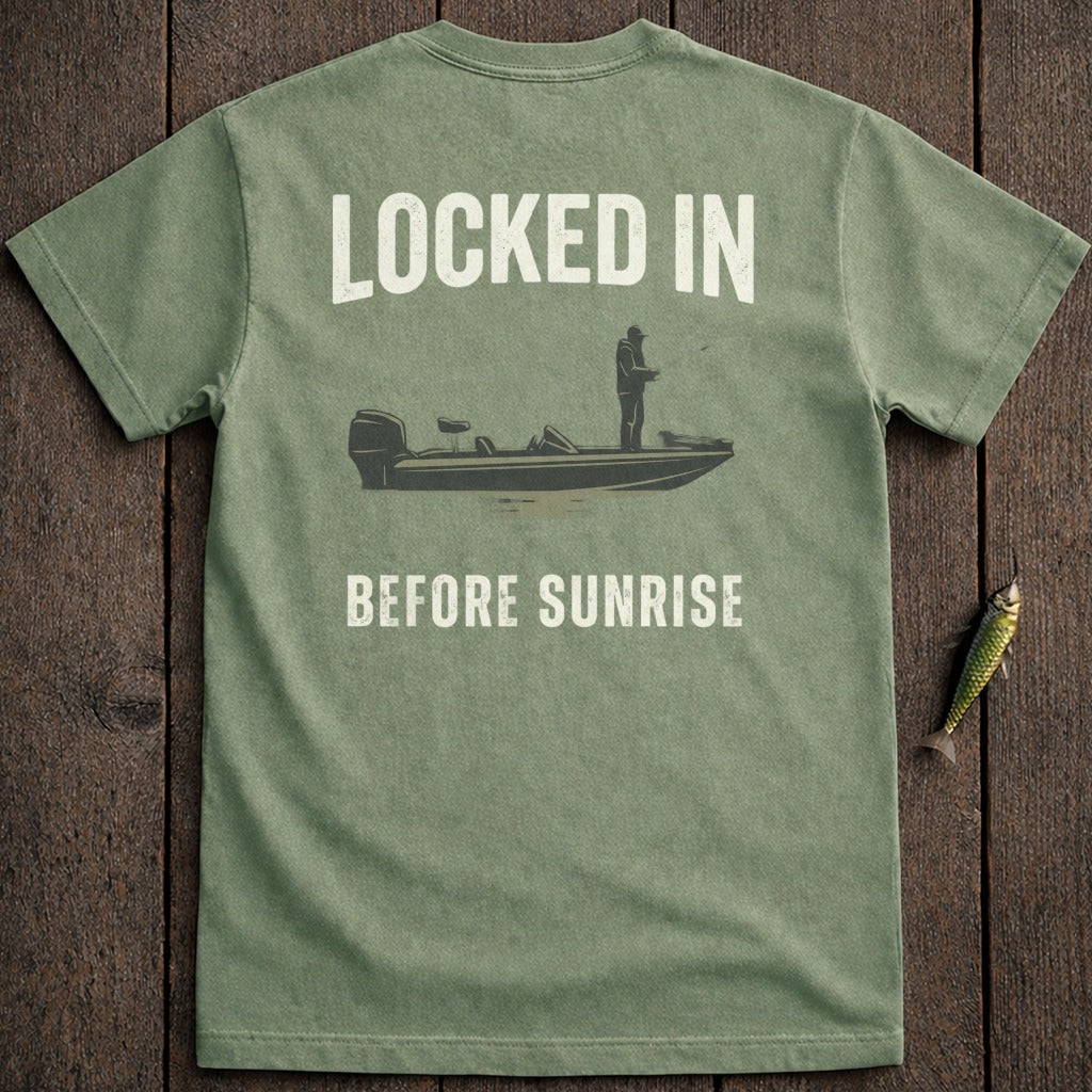 T-shirt with "Locked In Before Sunrise" and boat graphic.