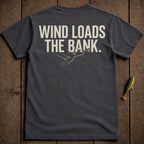 Dark gray t-shirt with "WIND LOADS THE BANK." text and a fishing graphic.