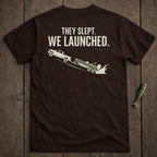 Brown t-shirt with white text and graphic of truck launching boat.