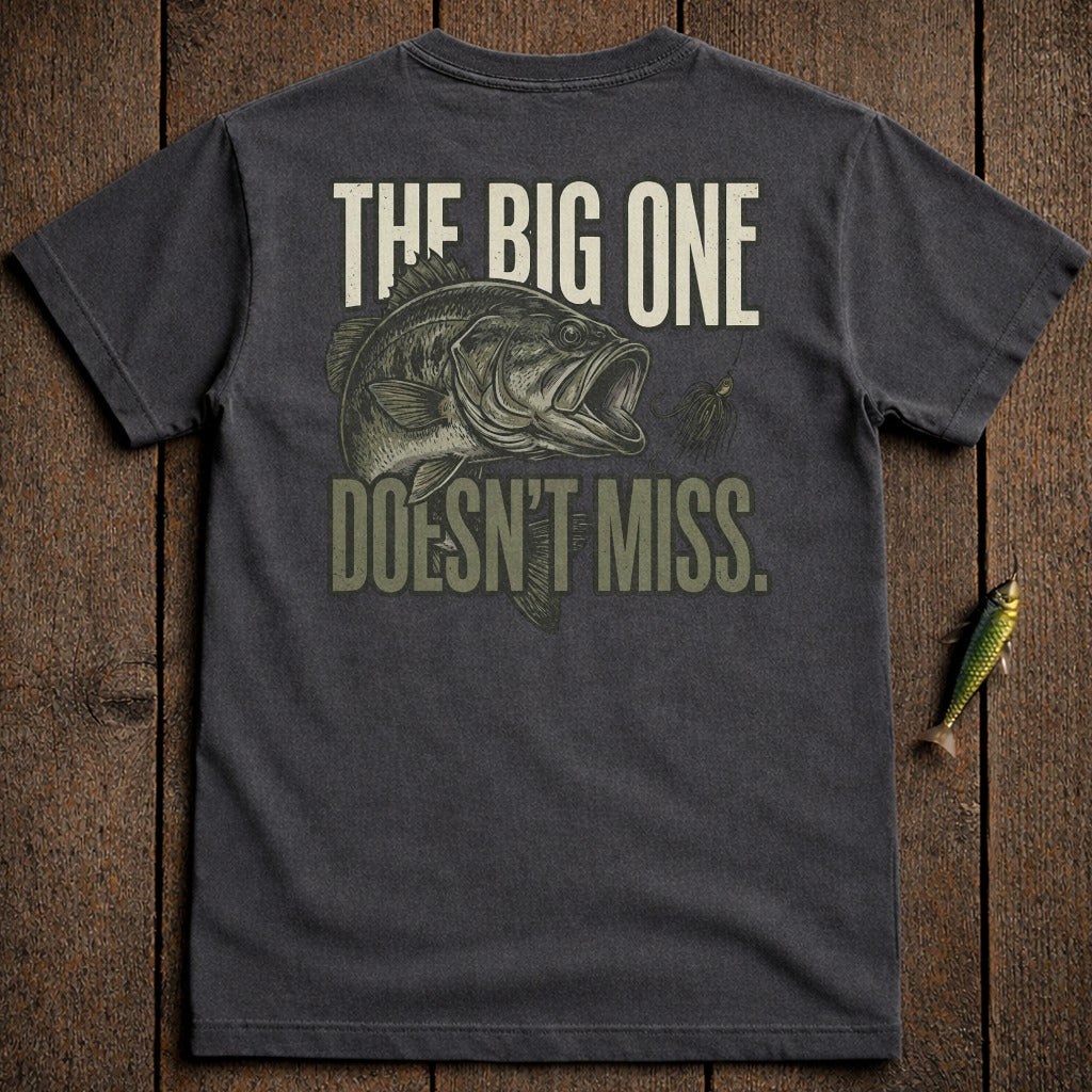 Dark t-shirt with graphic of a fish and text "THE BIG ONE DOESN'T MISS."