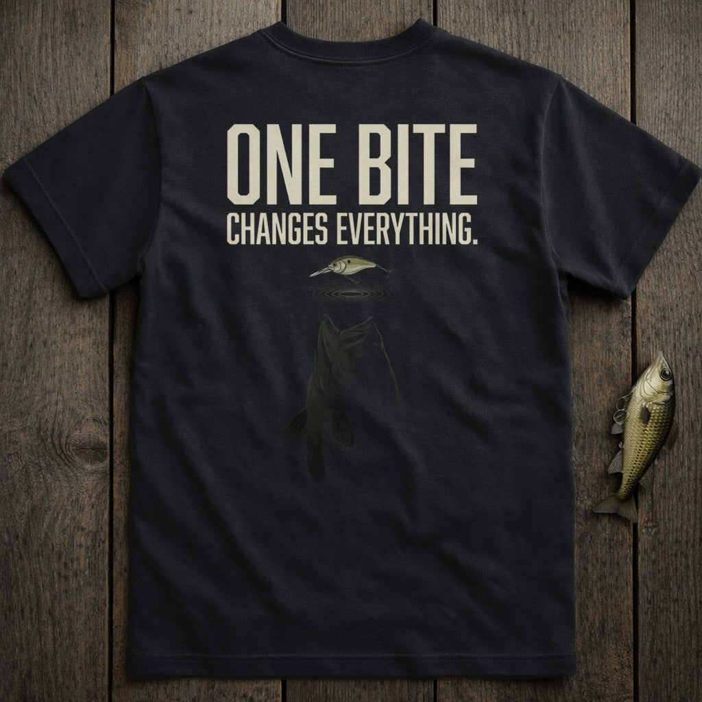 Black t-shirt with "ONE BITE CHANGES EVERYTHING" and fish graphic.