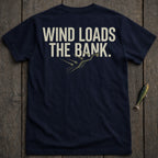 Navy t-shirt with "WIND LOADS THE BANK" text and a graphic of birds flying over fish.