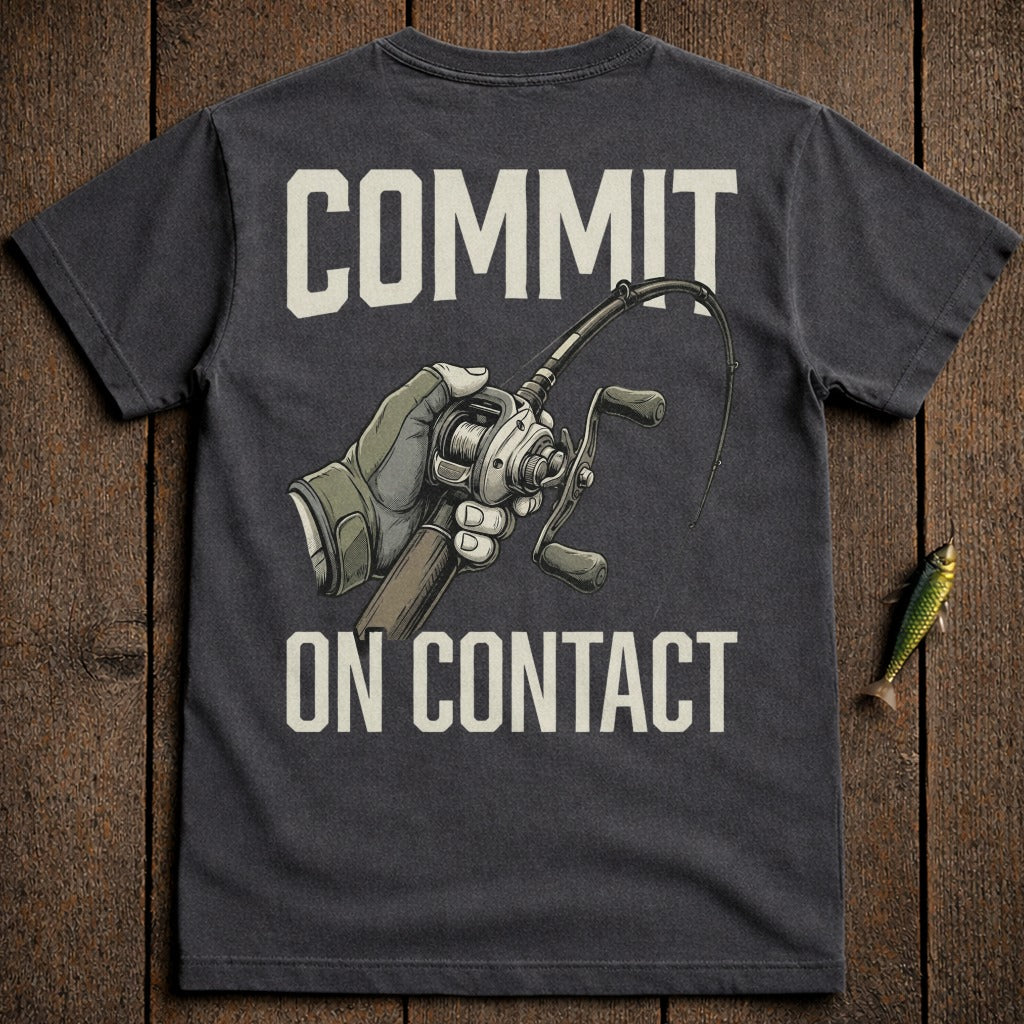 Dark t-shirt with "COMMIT ON CONTACT" and a hand holding a fishing rod.