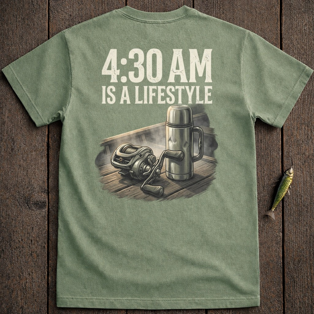 Green t-shirt with "4:30 AM IS A LIFESTYLE" text above fishing reel and thermos.