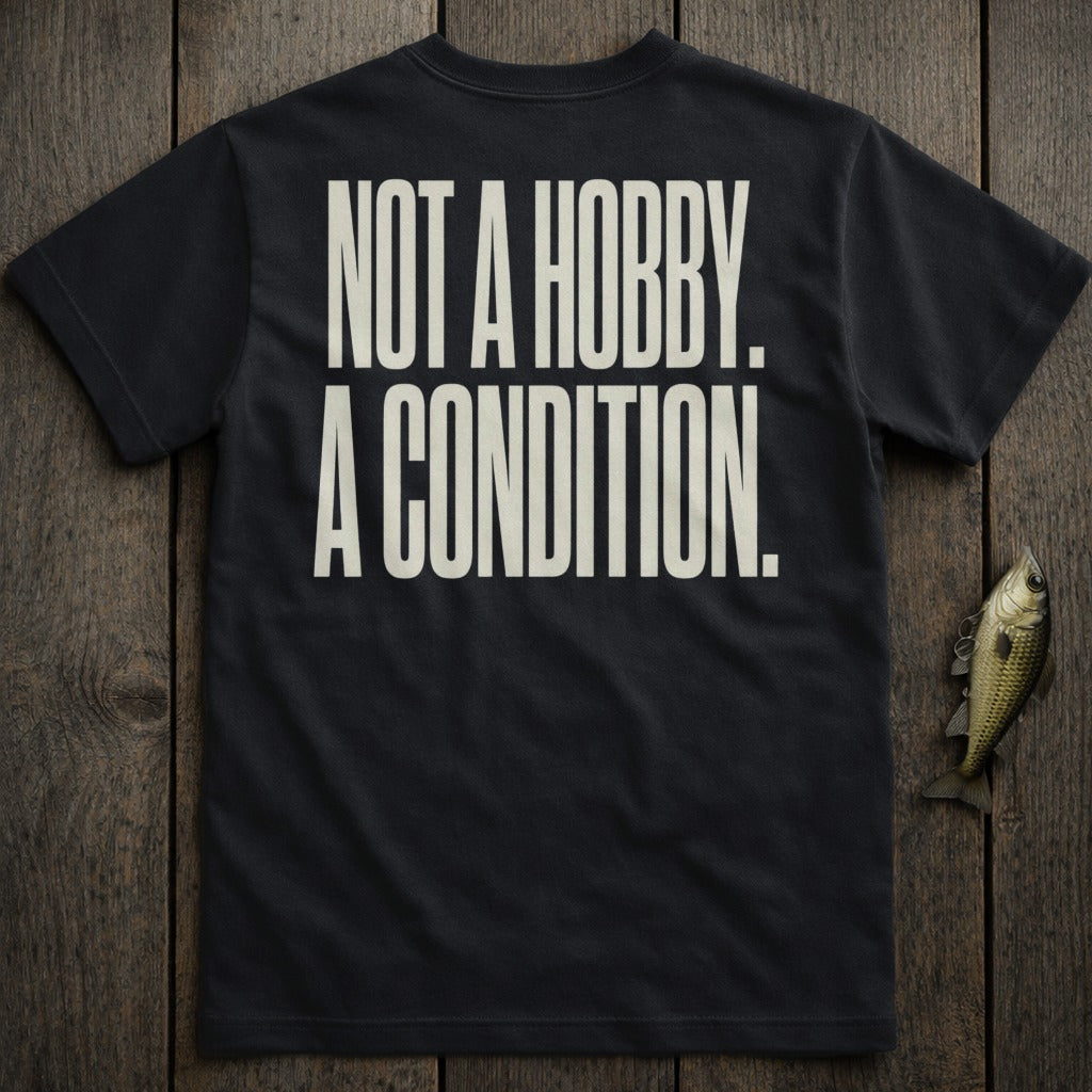 Dark t-shirt with white text "NOT A HOBBY. A CONDITION."