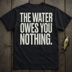 Black t-shirt with white text reading "THE WATER OWES YOU NOTHING."