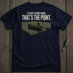 Navy t-shirt with graphic of a fisherman on a boat with text "IT COSTS SOMETHING. THAT'S THE POINT."