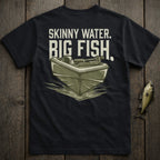 Black t-shirt with graphic of a jon boat and text "SKINNY WATER. BIG FISH."