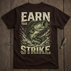 Brown t-shirt with bass leaping from water and text "EARN YOUR STRIKE".