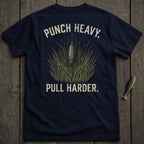 Navy t-shirt with "Punch Heavy. Pull Harder." text and fishing lure graphic.