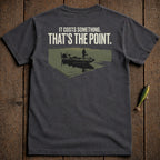 Dark t-shirt with text "IT COSTS SOMETHING. THAT'S THE POINT." over a fishing boat.