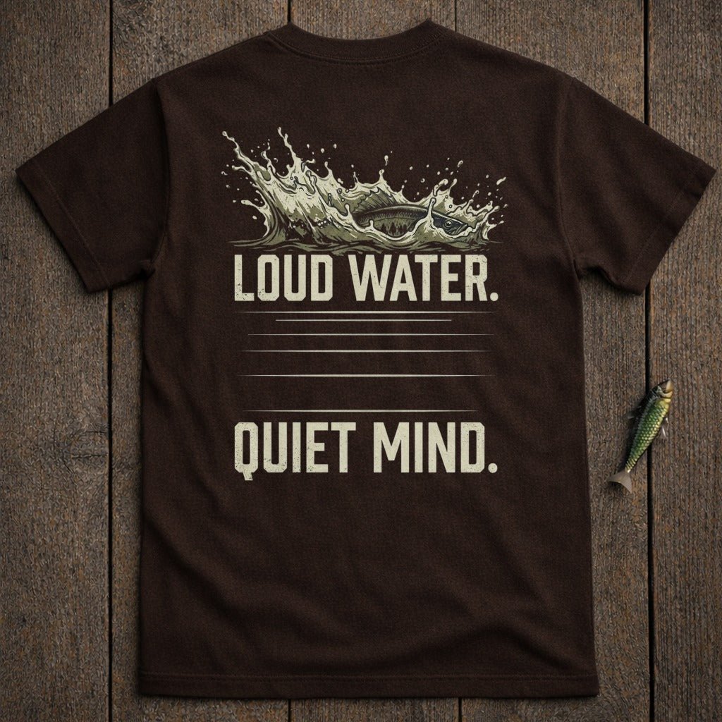 Brown t-shirt with splashing water and fish graphic, text "Loud Water. Quiet Mind."