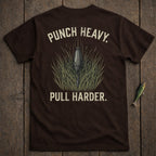 Brown t-shirt with "Punch Heavy. Pull Harder." and fishing lure design.
