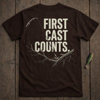Brown t-shirt with "FIRST CAST COUNTS." text and fishing lure graphic.